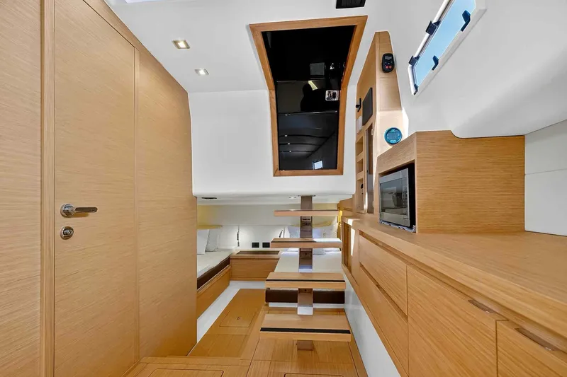 Seaduction Yacht Photos Pics Luxurious interior of 2023 Pardo Yachts 43, featuring modern wood finishes and sleek design.