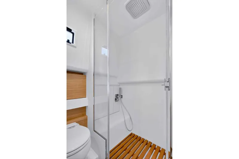 Seaduction Yacht Photos Pics Modern bathroom in 2023 Pardo Yachts 43, featuring sleek shower and wooden accents.