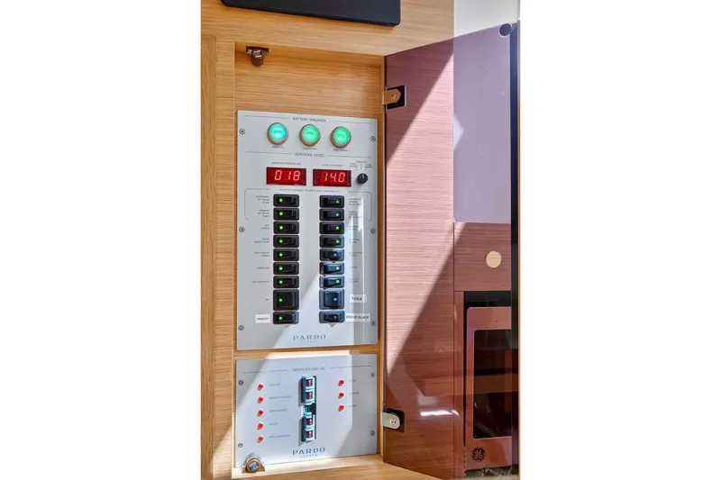 Seaduction Yacht Photos Pics Electrical control panel on 2023 Pardo Yachts 43, featuring switches and digital displays.