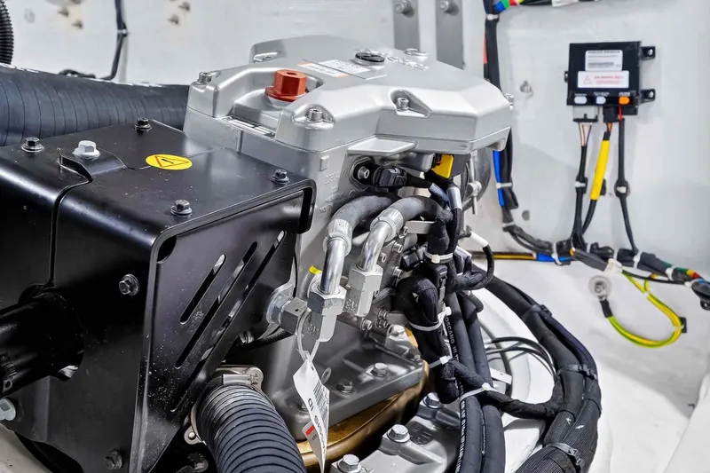 Seaduction Yacht Photos Pics Engine compartment of 2023 Pardo Yachts 43, showcasing intricate wiring and components.