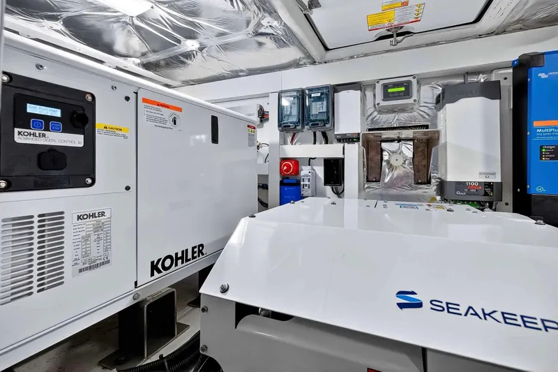 Seaduction Yacht Photos Pics Engine room of 2023 Pardo Yachts 43 featuring Kohler and Seakeeper equipment.