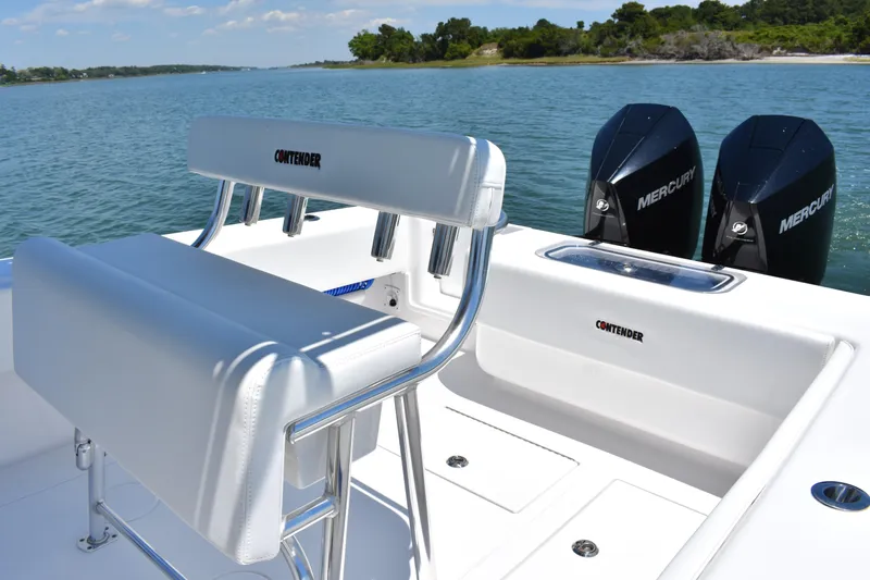  Yacht Photos Pics 2024 Contender 28 Tournament boat with dual Mercury engines on a sunny day.