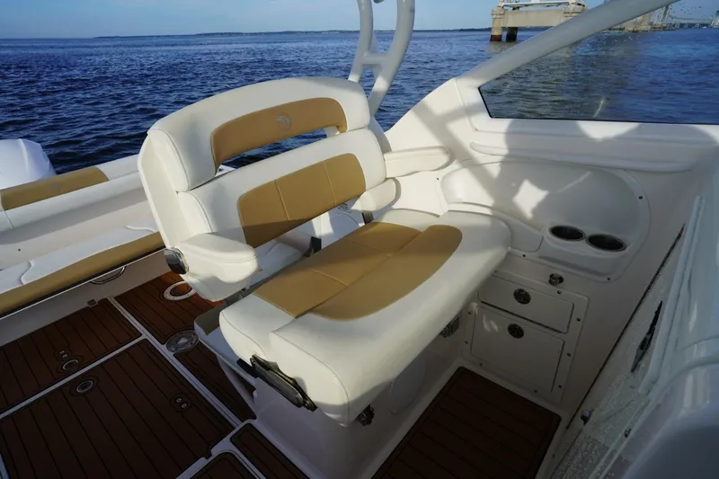  Yacht Photos Pics Interior of 2016 Edgewater 280 CX boat with tan and white seating.