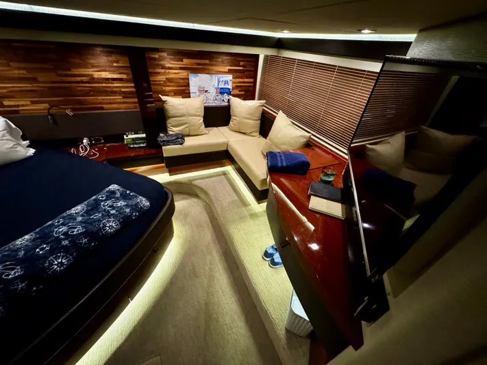 For Whom The Bell Tolls Yacht Photos Pics Luxurious interior of 2017 Sea Ray L590 yacht with cozy seating and elegant decor.