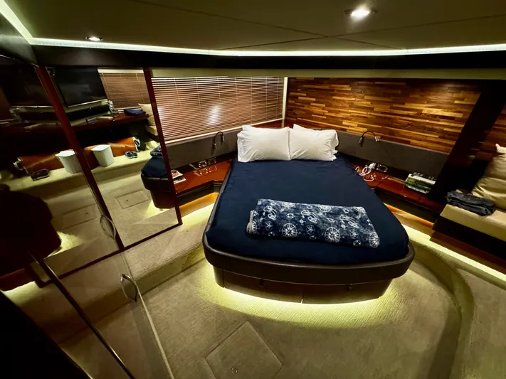 For Whom The Bell Tolls Yacht Photos Pics Luxurious 2017 Sea Ray L590 yacht bedroom with modern design and ambient lighting.