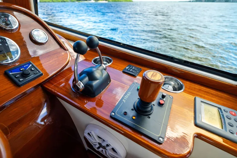 Capri Yacht Photos Pics 2008 Hinckley Talaria 38R Convertible dashboard with controls and water view.