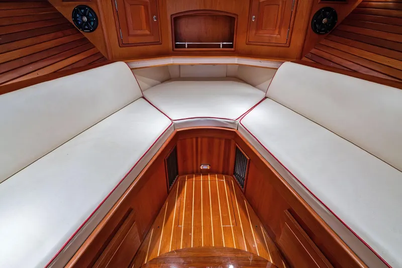 Capri Yacht Photos Pics Interior of 2008 Hinckley Talaria 38R Convertible with elegant wood and white seating.