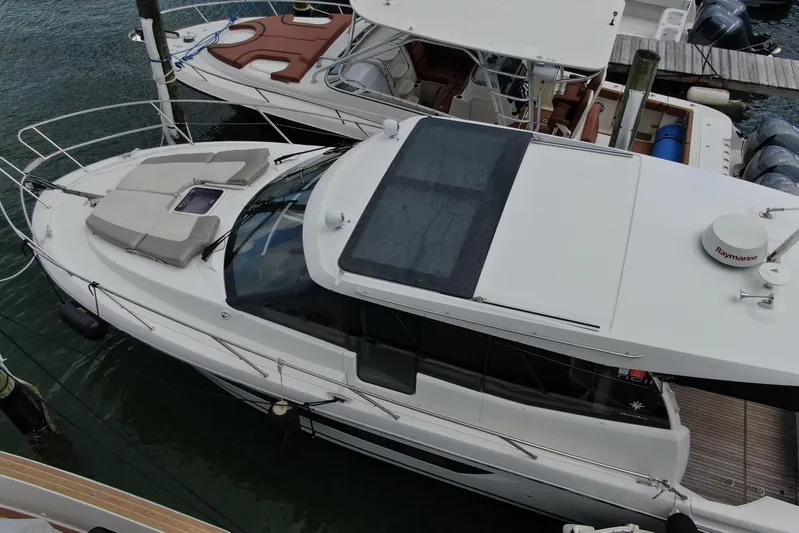 Andalucia Yacht Photos Pics 2017 Jeanneau NC 11 boat docked at marina, aerial view.