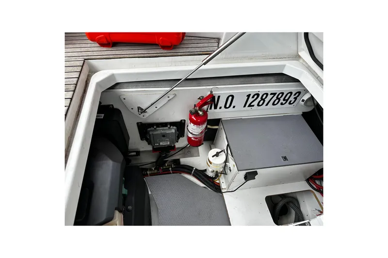 Andalucia Yacht Photos Pics 2017 Jeanneau NC 11 boat interior with fire extinguisher and equipment.