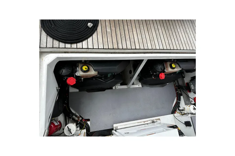 Andalucia Yacht Photos Pics Engine compartment of a 2017 Jeanneau NC 11 boat, showcasing dual engines.