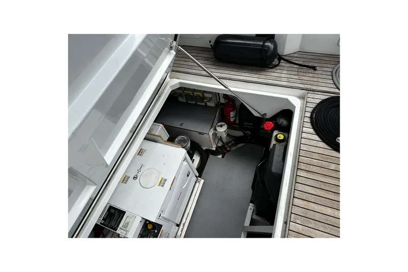 Andalucia Yacht Photos Pics Engine compartment of 2017 Jeanneau NC 11 boat, featuring equipment and storage.
