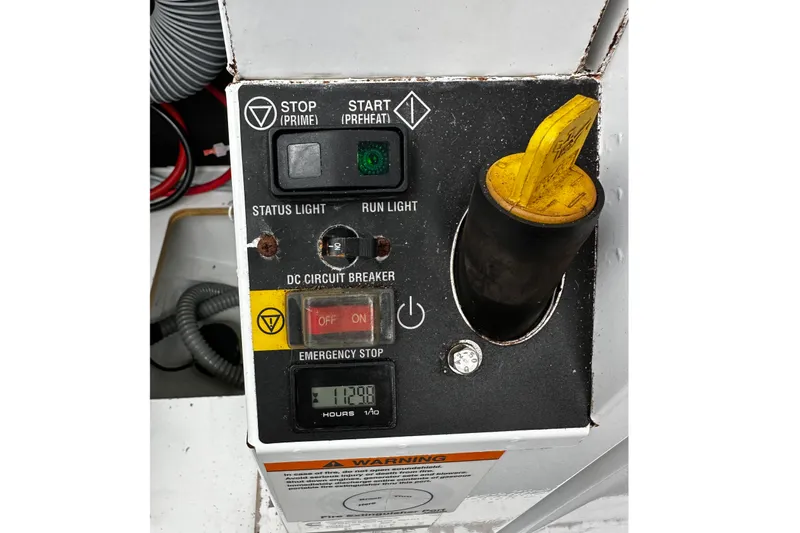 Andalucia Yacht Photos Pics Control panel of a 2017 Jeanneau NC 11 boat with emergency stop and circuit breaker.