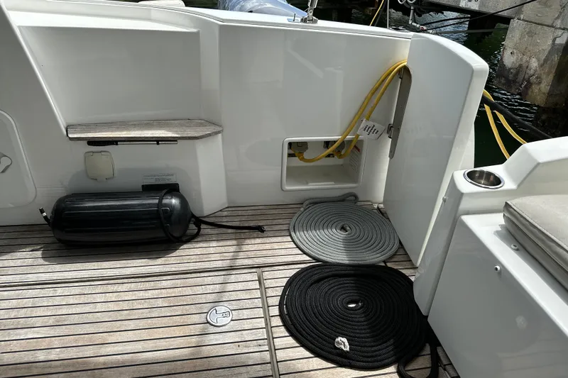 Andalucia Yacht Photos Pics 2017 Jeanneau NC 11 boat deck with ropes and fender.