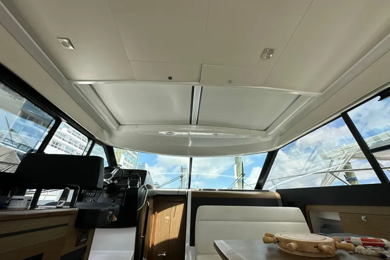 Andalucia Yacht Photos Pics Interior of 2017 Jeanneau NC 11 yacht with panoramic windows and modern design.