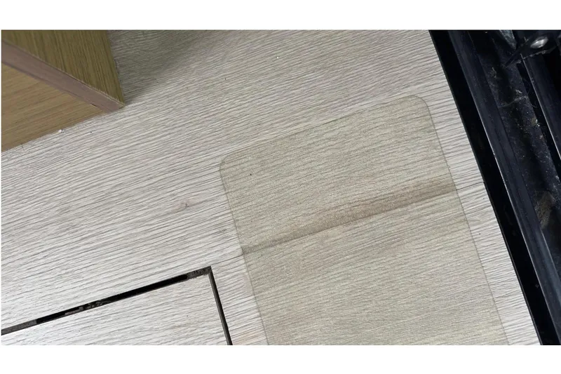 Andalucia Yacht Photos Pics Wooden flooring detail on a 2017 Jeanneau NC 11 boat interior.