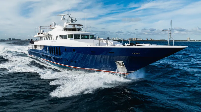 High Occupancy Yacht Photos Pics Luxurious 1989 Oceanfast Custom yacht cruising on open water under a clear sky.