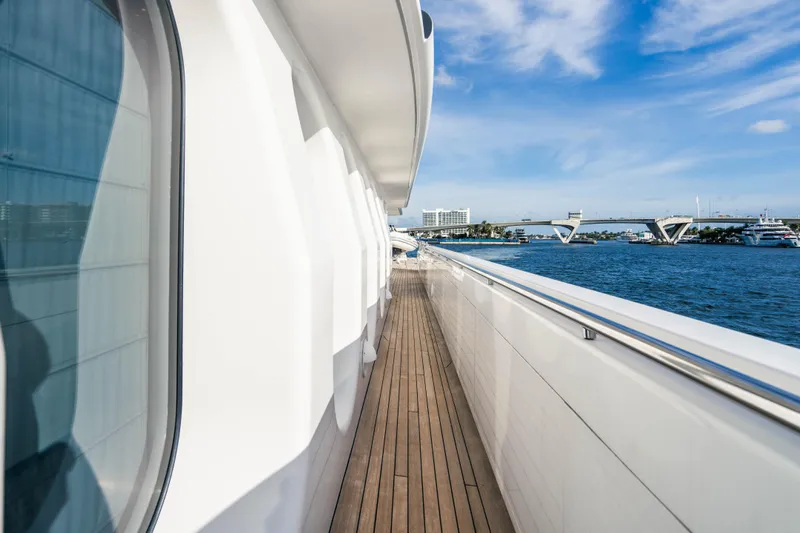 High Occupancy Yacht Photos Pics Side deck view of 1989 Oceanfast Custom yacht with ocean and bridge in background.