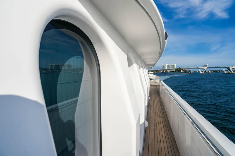 High Occupancy Yacht Photos Pics Side view of 1989 Oceanfast Custom yacht on calm blue waters.