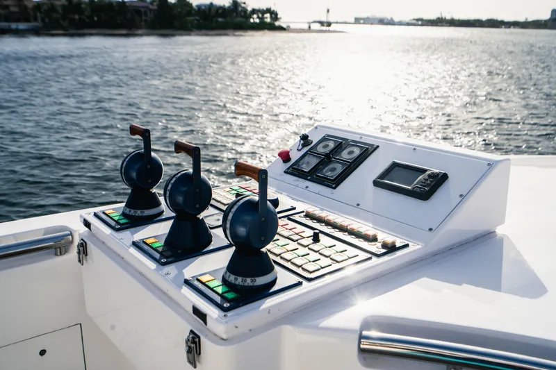 High Occupancy Yacht Photos Pics Control panel of a 1989 Oceanfast Custom yacht overlooking the water.