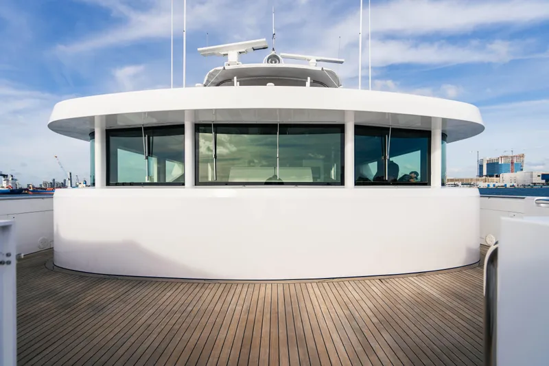 High Occupancy Yacht Photos Pics Oceanfast Custom 1989 yacht deck with modern design and panoramic windows.