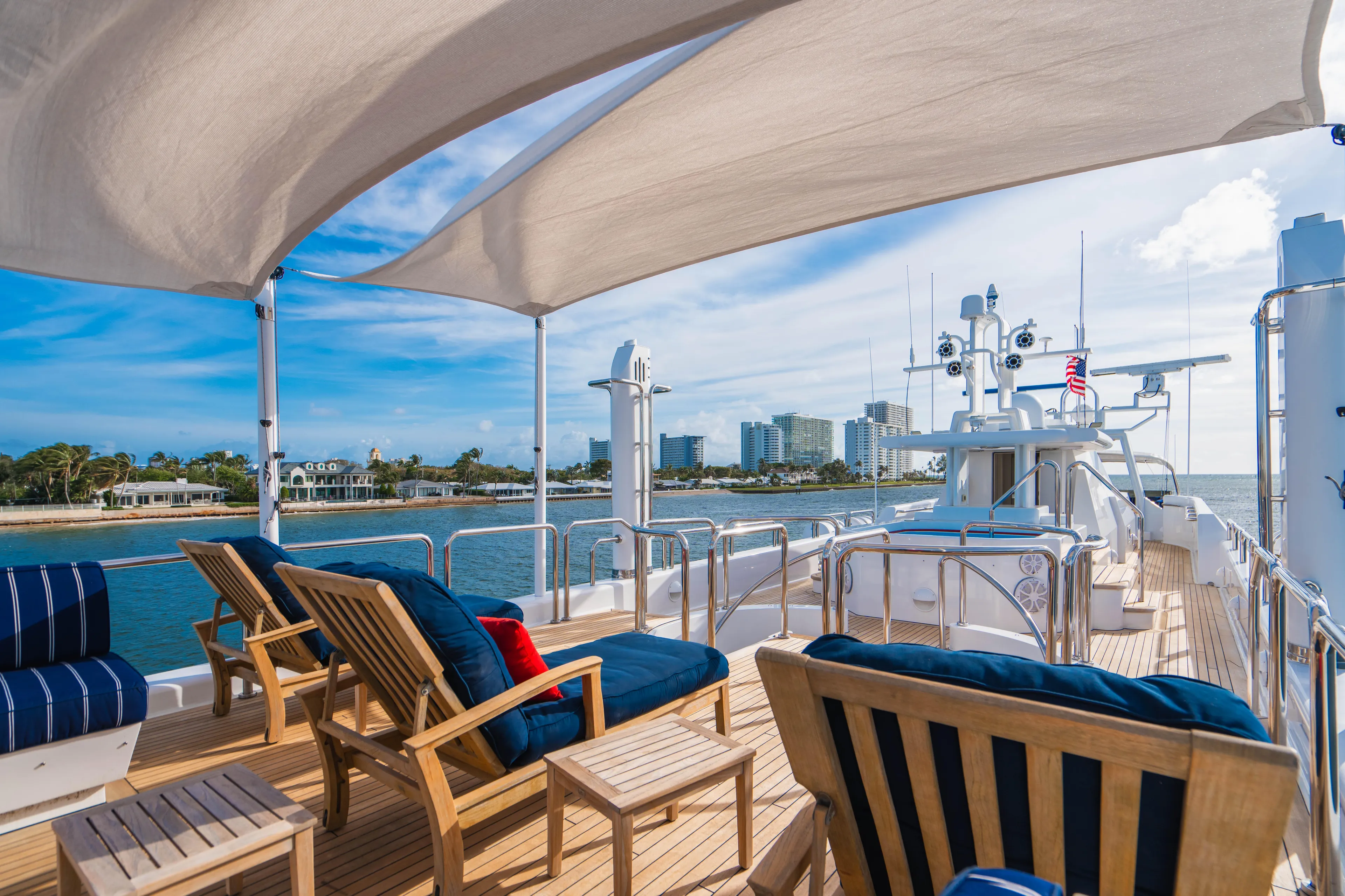 High Occupancy Yacht Photos Pics Luxurious 1989 Oceanfast Custom yacht deck with seating, ocean view, and modern amenities.