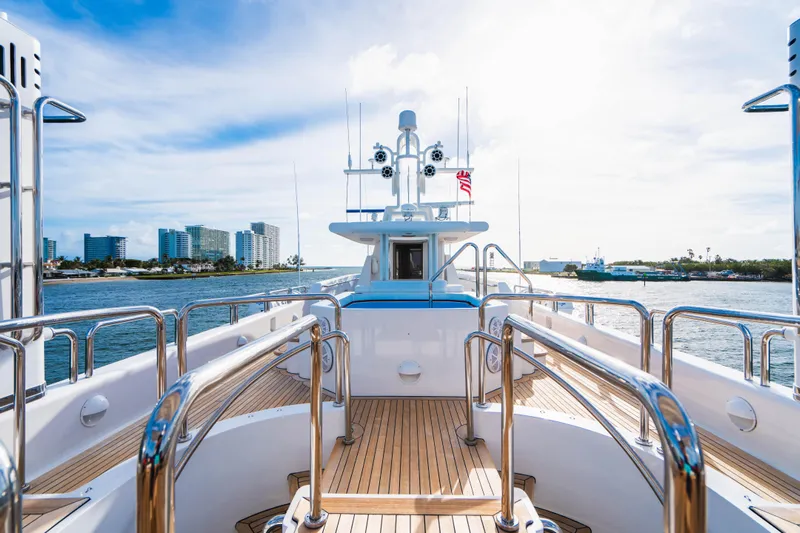 High Occupancy Yacht Photos Pics Luxurious 1989 Oceanfast Custom yacht deck with city skyline and ocean view.