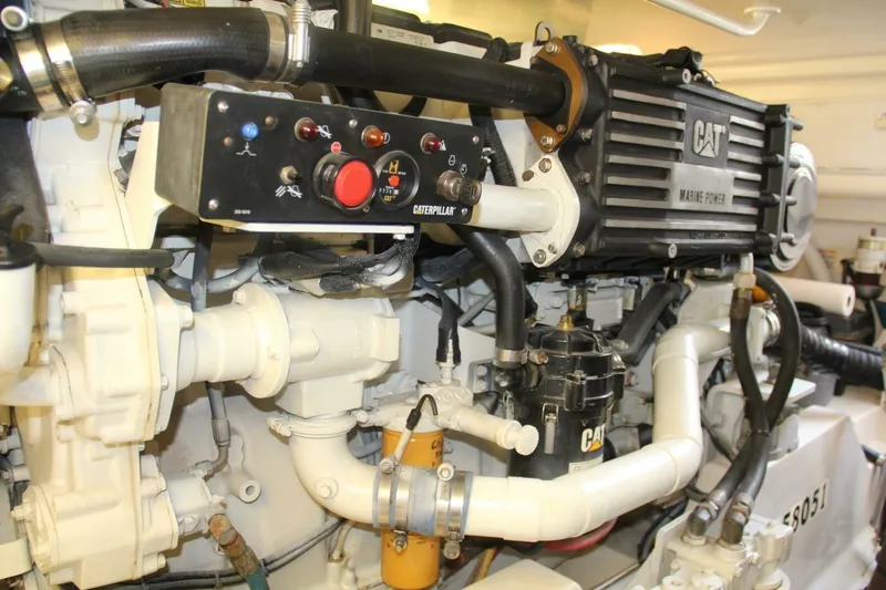 Merry Yacht Yacht Photos Pics Engine room of 2004 Cabo 48 Flybridge with CAT marine power components.