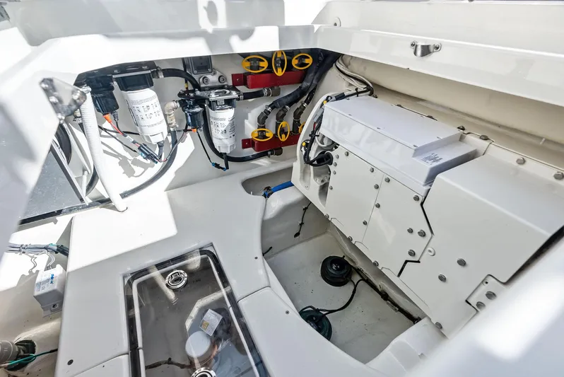 Verdandi Yacht Photos Pics Engine compartment of 2018 HCB 53 Sue&ntilde;os boat, showcasing mechanical components and wiring.