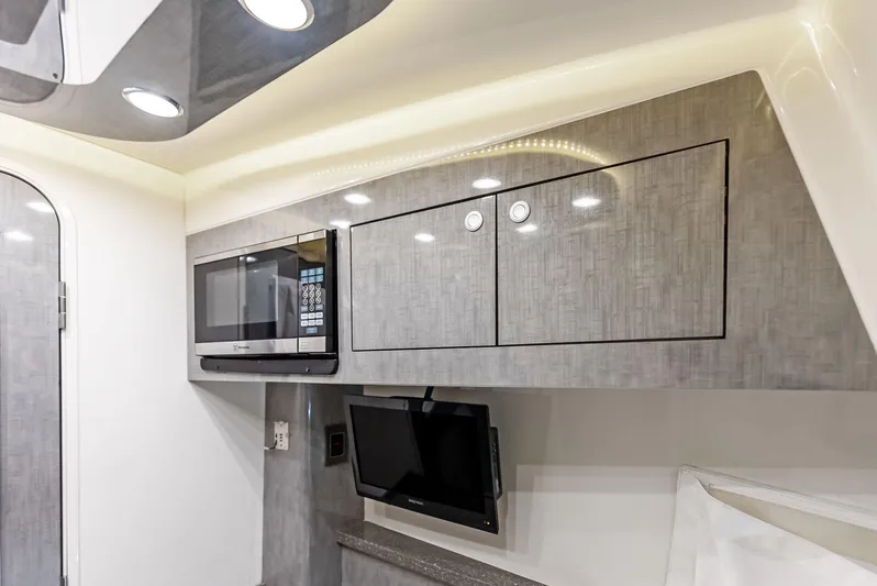 Verdandi Yacht Photos Pics Modern interior of 2018 HCB 53 Sue&ntilde;os with microwave and TV.