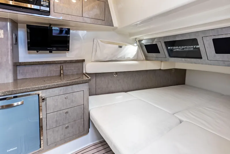 Verdandi Yacht Photos Pics Interior of 2018 HCB 53 Sue&ntilde;os boat with kitchenette and sleeping area.