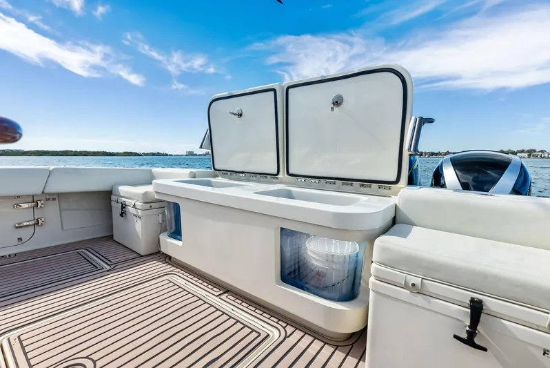 Verdandi Yacht Photos Pics 2018 HCB 53 Sue&ntilde;os boat deck with storage compartments and ocean view.