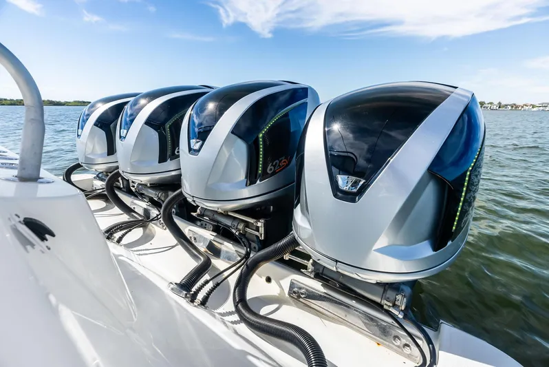 Verdandi Yacht Photos Pics Four powerful outboard engines on a 2018 HCB 53 Sue&ntilde;os boat, cruising on open water.