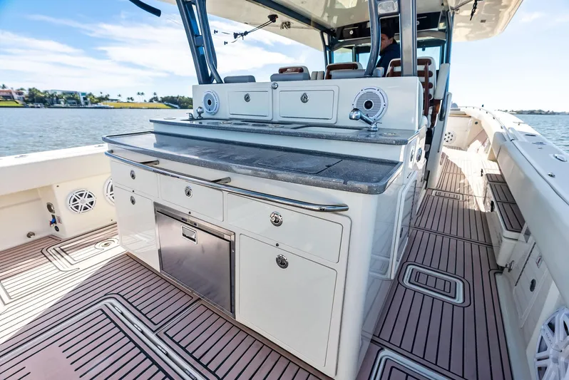 Verdandi Yacht Photos Pics Luxury deck of 2018 HCB 53 Sue&ntilde;os boat with sleek cabinetry and seating.