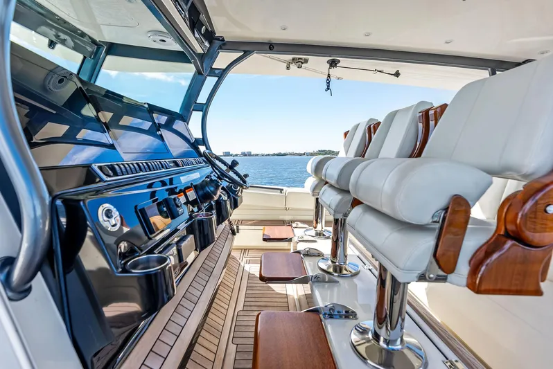 Verdandi Yacht Photos Pics Interior view of 2018 HCB 53 Sue&ntilde;os boat with luxurious seating and control panel.