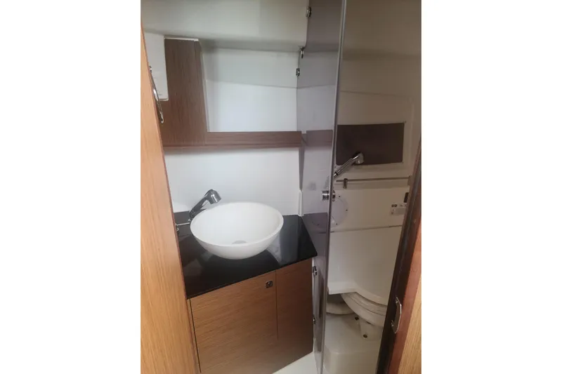  Yacht Photos Pics 2020 Jeanneau Leader 9.0 WA boat bathroom with sink and toilet.