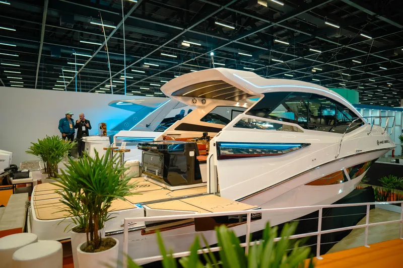  Yacht Photos Pics 2025 NHD 365 HT PLUS yacht displayed at a boat show, featuring sleek design and modern amenities.
