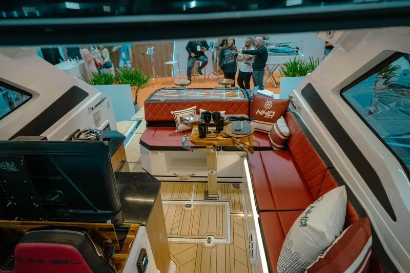  Yacht Photos Pics Luxurious interior of 2025 NHD 365 HT PLUS yacht with red seating and modern amenities.