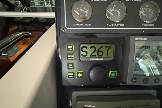 Ocean Cloud Yacht Photos Pics Control panel of a 2001 Tiara Yachts 3500 Open, featuring navigation and engine gauges.