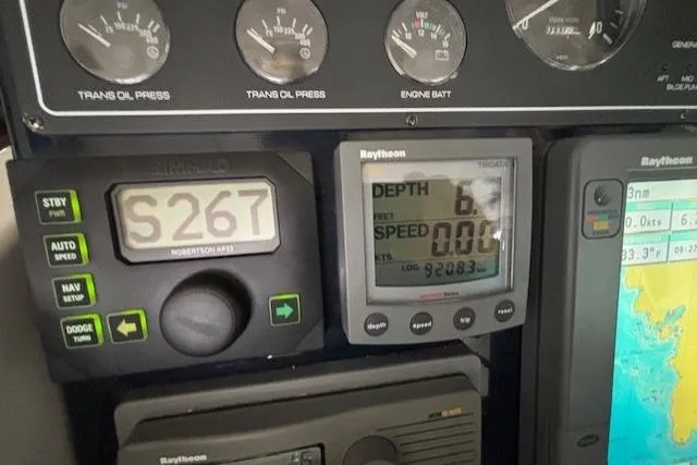 Ocean Cloud Yacht Photos Pics Control panel of a 2001 Tiara Yachts 3500 Open, displaying navigation and depth information.