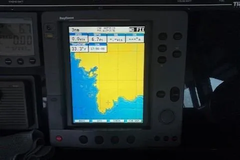 Ocean Cloud Yacht Photos Pics Navigation system on 2001 Tiara Yachts 3500 Open, displaying coastal map and coordinates.