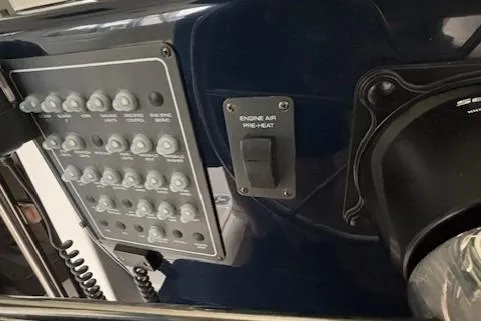 Ocean Cloud Yacht Photos Pics Control panel of a 2001 Tiara Yachts 3500 Open, featuring engine air pre-heat switch.