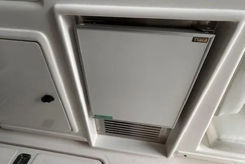 Ocean Cloud Yacht Photos Pics 2001 Tiara Yachts 3500 Open interior with built-in refrigerator.