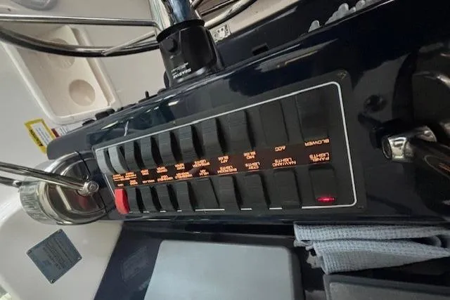 Ocean Cloud Yacht Photos Pics Control panel of a 2001 Tiara Yachts 3500 Open boat, featuring labeled switches.
