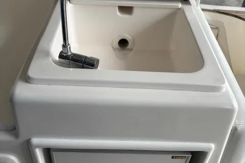 Ocean Cloud Yacht Photos Pics 2001 Tiara Yachts 3500 Open sink with chrome faucet in cabin area.