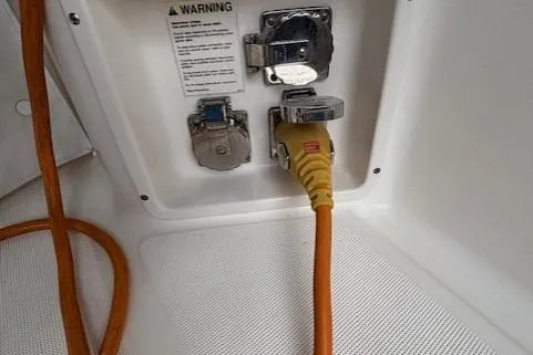 Ocean Cloud Yacht Photos Pics 2001 Tiara Yachts 3500 Open power connection with orange cable and warning label.