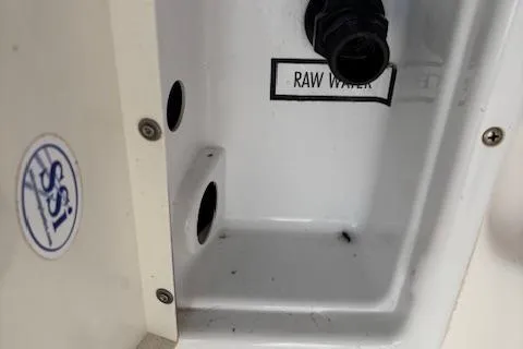 Ocean Cloud Yacht Photos Pics 2001 Tiara Yachts 3500 Open raw water intake detail with SSI logo.