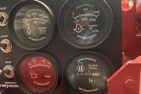 Ocean Cloud Yacht Photos Pics Close-up of 2001 Tiara Yachts 3500 Open engine gauges, displaying temperature, oil pressure, volts, and hours.