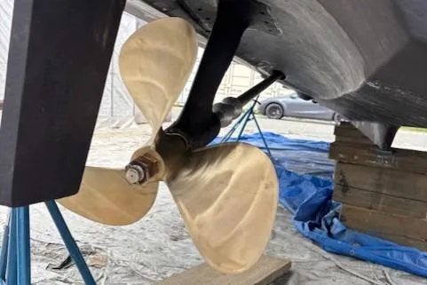 Ocean Cloud Yacht Photos Pics Propeller of 2001 Tiara Yachts 3500 Open, displayed on a stand for maintenance.