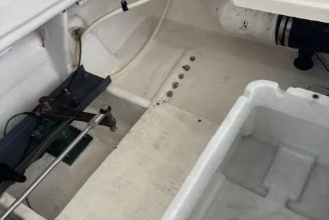 Ocean Cloud Yacht Photos Pics 2001 Tiara Yachts 3500 Open interior detail, showcasing clean white compartments and mechanical components.