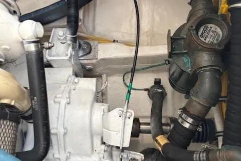 Ocean Cloud Yacht Photos Pics Engine compartment of a 2001 Tiara Yachts 3500 Open, showcasing mechanical components.